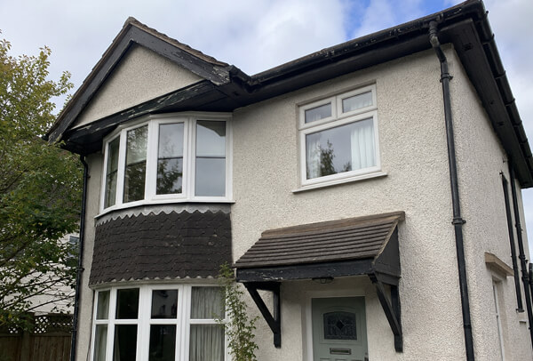 Roofline before colour change in Kettering with dated fascias and gutters